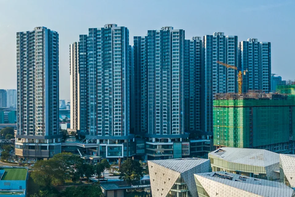 R&F Princess Cove towers glowing at night in Johor Bahru